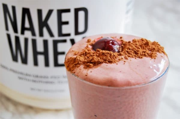 Meet your cravings with this black forest grass-fed whey protein smoothie - a satisfying, sweet, high-protein smoothie! #sponsored by Naked Nutrition Grass-Fed Whey Protein Powder