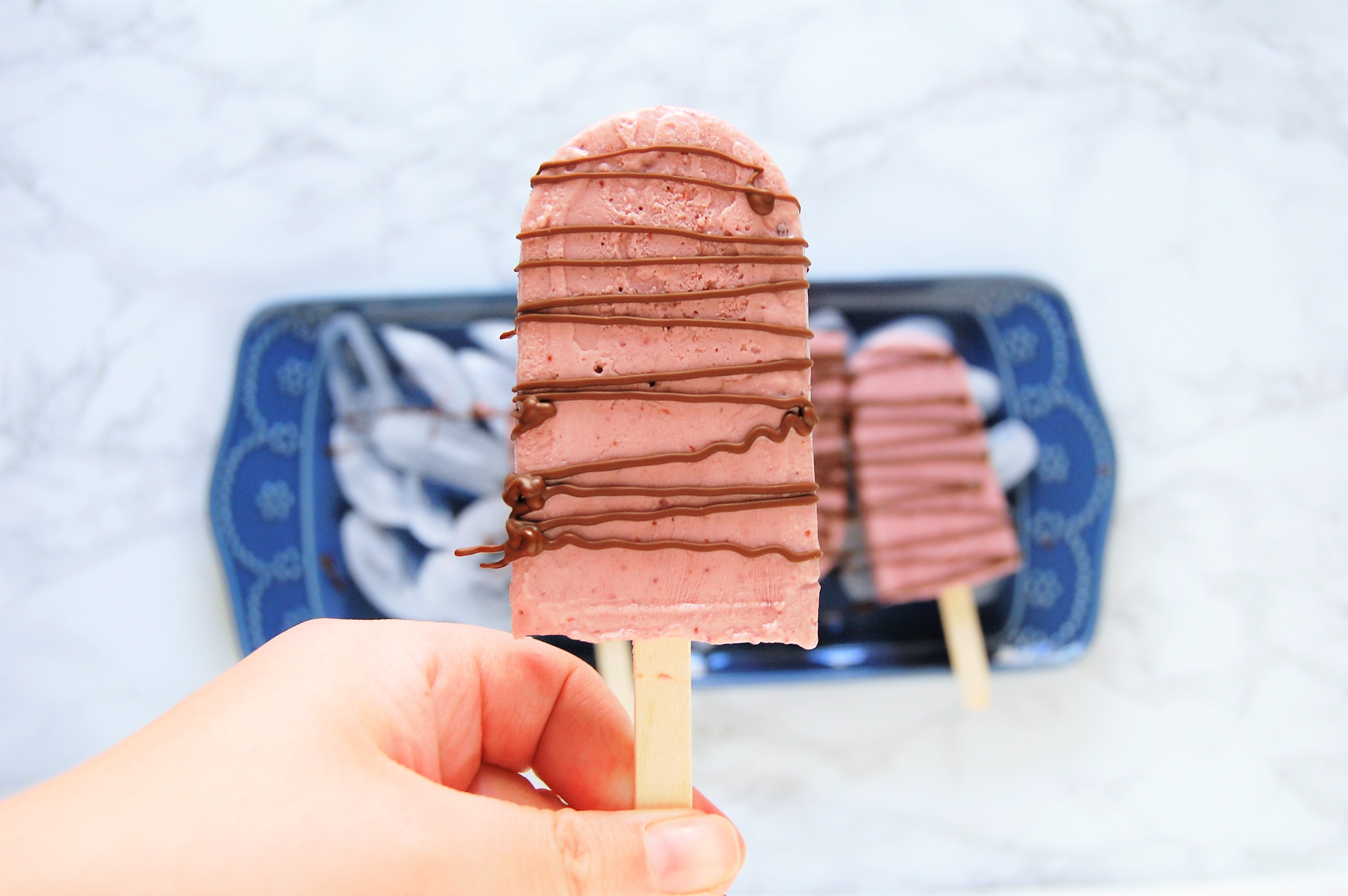 Cherry Cheesecake Protein Pops are a healthy treat recipe, easy to make with just four ingredients! This is a refreshing treat packed with fruit and protein, perfect for the whole family this summertime! | recipe, healthy recipe, healthy dessert, protein dessert, easy recipe, cherries, cheesecake, popsicle, nutrition, dietitian |