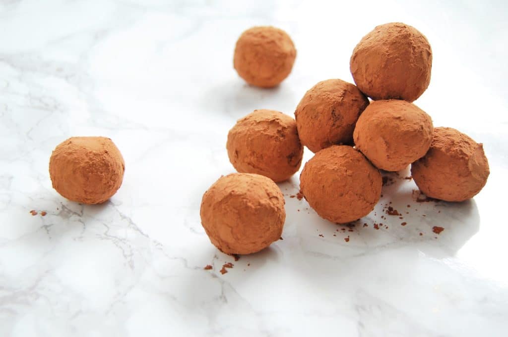 Make these simple, bite-sized, four-ingredient Chocolate Avocado Truffles for your next dinner party or special occasion! They require very minimal hands-on time and can be made ahead. Check the post at nutritiontofit.com for other ways to get creative with these chocolate avocado truffles, too! @nutritiontofit