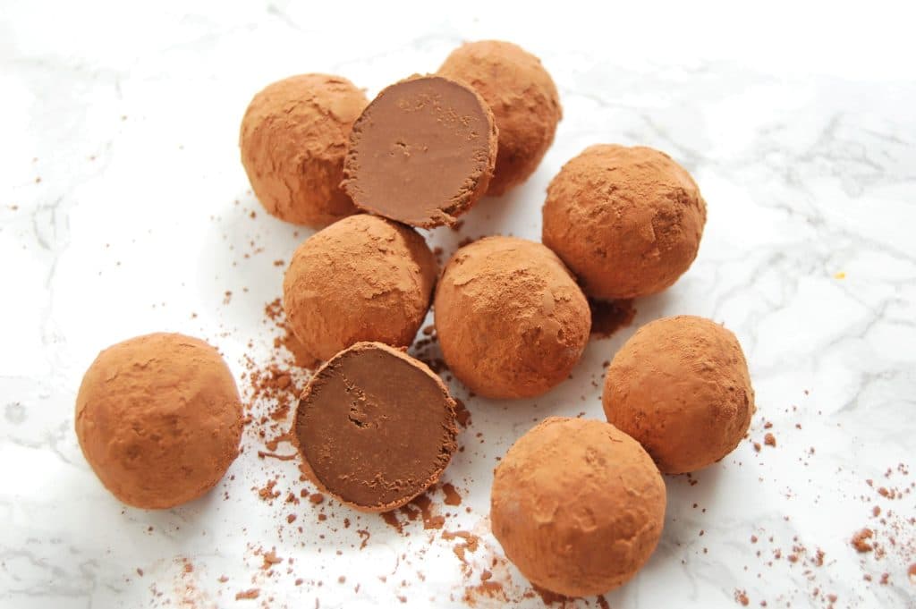 Make these simple, bite-sized, four-ingredient Chocolate Avocado Truffles for your next dinner party or special occasion! They require very minimal hands-on time and can be made ahead. Check the post at nutritiontofit.com for other ways to get creative with these chocolate avocado truffles, too! @nutritiontofit
