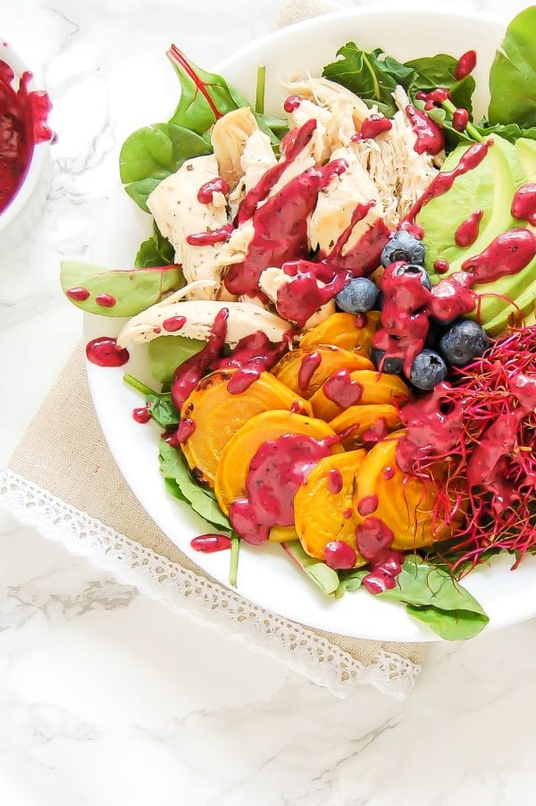 This golden beet salad with blueberry lime dressing is a colorful, healthy salad recipe that is packed with nutrition and flavor!