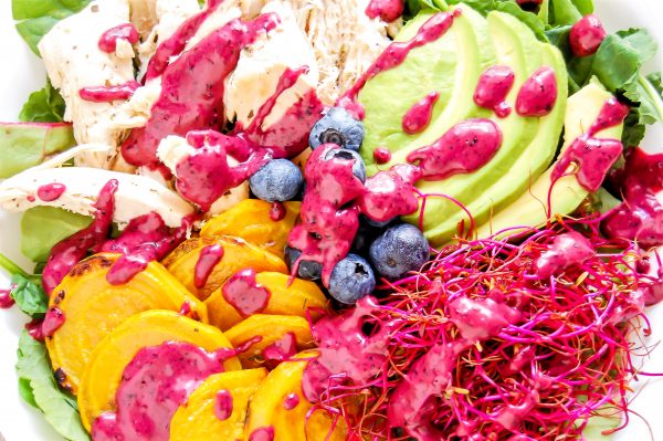 This golden beet salad with blueberry lime dressing is a colorful, healthy salad recipe that is packed with nutrition and flavor!