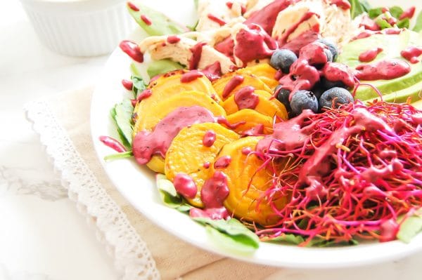 This golden beet salad with blueberry lime dressing is a colorful, healthy salad recipe that is packed with nutrition and flavor!