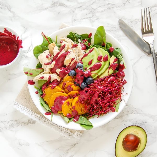 This golden beet salad with blueberry lime dressing is a colorful, healthy salad recipe that is packed with nutrition and flavor!