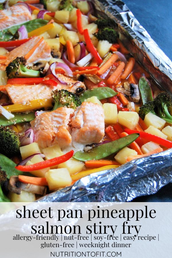 Pinterest Image of sheet pan pineapple salmon stir fry pulled fresh from the oven.