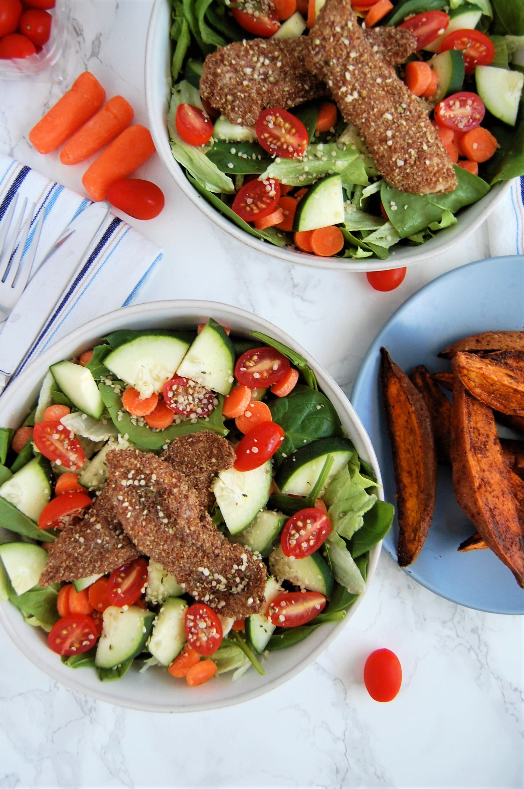 https://nutritiontofit.com/wp-content/uploads/2018/01/Flax-Seed-Chicken-Tenders-on-a-Salad.jpg