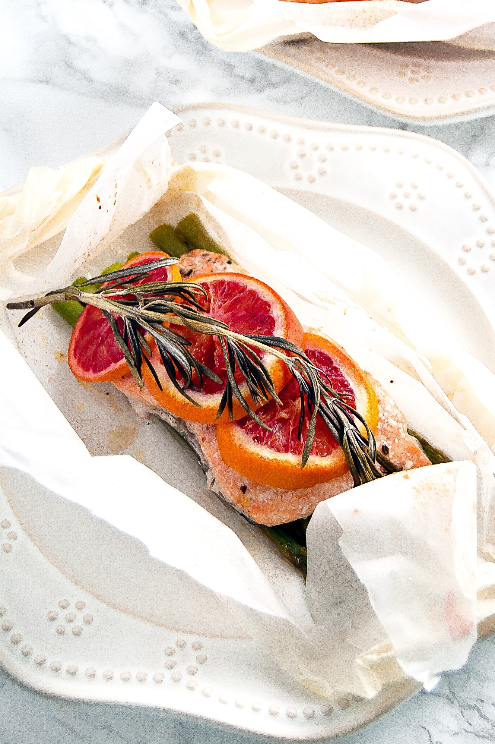 Blood Orange Rosemary Salmon en Papillote is a simple, yet sophisticated salmon dinner for two, perfect for a romantic date night in or Valentine's Day. 