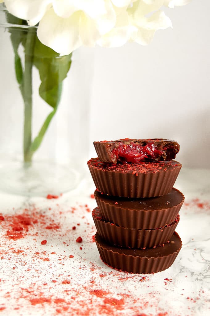 These Raspberry Caramel Chocolate Cups make a simple dessert that have just four ingredients! With a fruit-based center, the only added sugar is in whatever type of chocolate you choose! Gluten-free, nut-free, optional vegan, dairy-free. 