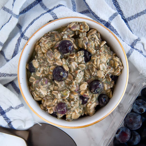 These Blueberry Matcha Overnight Oats are everything that you need in the morning: nourishing, filling, delicious, have a little caffeine, and require less than five minutes of prep time the night before! | no added sugar, gluten-free, dairy-free, vegan, nut-free | Nutrition to Fit