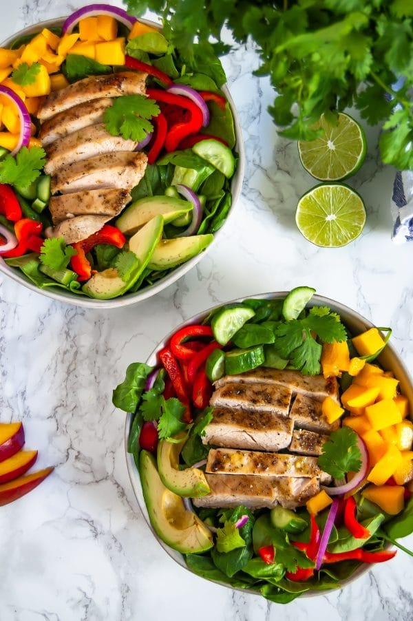 This mango chicken salad with cilantro lime dressing is a fresh and flavorful salad perfect to keep you energized in warmer months. Naturally gluten-free and dairy-free, this mango chicken salad is full of protein, fiber, vitamin A, vitamin C, and antioxidants.