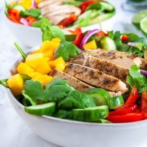This mango chicken salad with cilantro lime dressing is a fresh and flavorful salad perfect to keep you energized in warmer months. Naturally gluten-free and dairy-free, this mango chicken salad is full of protein, fiber, vitamin A, vitamin C, and antioxidants.