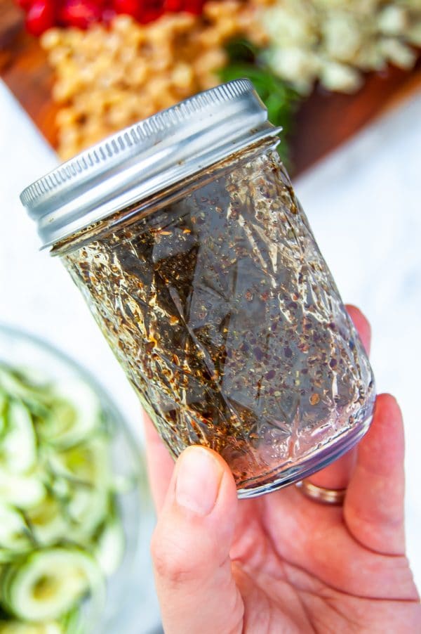 Antipasto salad gets a light and fresh take with this zucchini noodle antipasto salad. A fun zucchini noodle pasta salad, it's perfect with any healthy summer meal.