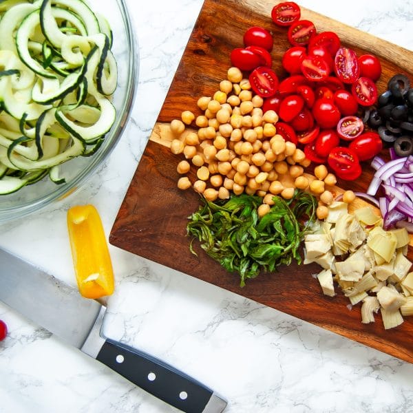 Antipasto salad gets a light and fresh take with this zucchini noodle antipasto salad. A fun zucchini noodle pasta salad, it's perfect with any healthy summer meal.