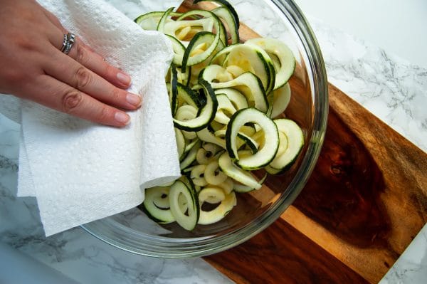 Antipasto salad gets a light and fresh take with this zucchini noodle antipasto salad. A fun zucchini noodle pasta salad, it's perfect with any healthy summer meal.