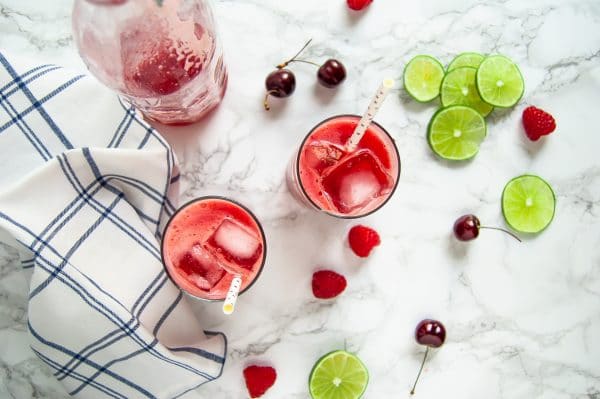 This sparkling berry cherry limeade is a refreshing, low-sugar drink that's easy to make at home with a few simple, real food ingredients.