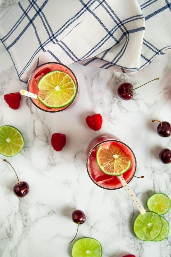 This sparkling berry cherry limeade is a refreshing, low-sugar drink that's easy to make at home with a few simple, real food ingredients.