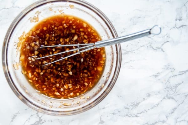 This four-ingredient garlic ginger sauce pairs perfectly with an easy chicken stir fry for a simple, healthy meal that can be made on a busy weeknight or easily added to your meal prep rotation.