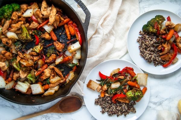 Easy chicken stir fry with garlic ginger sauce is a simple, healthy meal that can be made on a busy weeknight or easily added to your meal prep rotation.