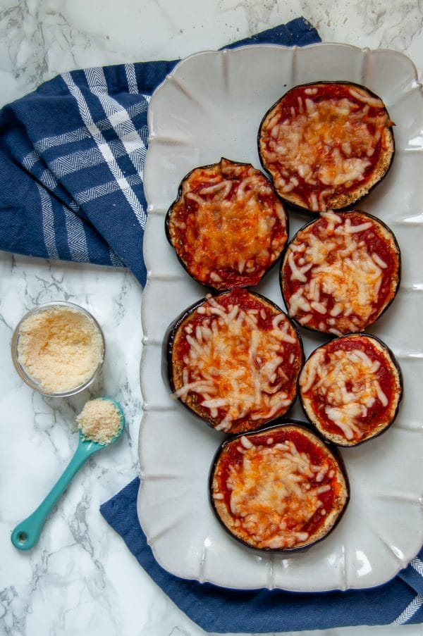 Eggplant pizzas are a healthy recipe to help you and your kids eat more vegetables! Vary the flavors with fun toppings of choice!