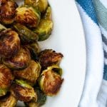 Maple dijon brussels sprouts are your answer to add flavor to easy roasted brussels sprouts. Try this easy, healthy side dish recipe today!