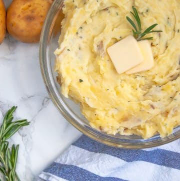 Greek yogurt mashed potatoes are a lighter mashed potato recipe that are packed with flavor. They're your perfect go-to homemade mashed potato recipe, even for Thanksgiving!