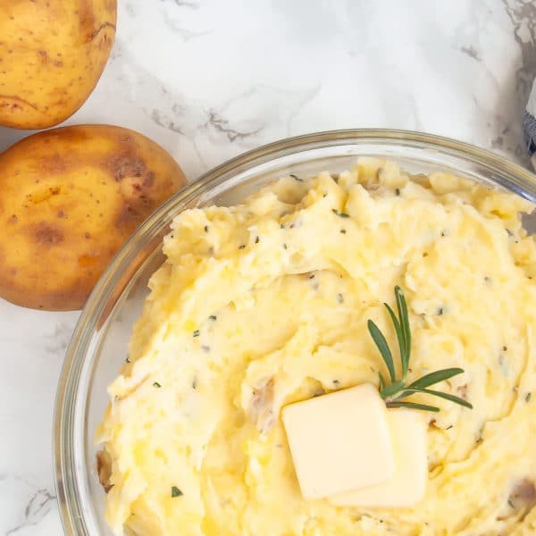 Greek yogurt mashed potatoes are a lighter mashed potato recipe that are packed with flavor. They're your perfect go-to homemade mashed potato recipe, even for Thanksgiving!