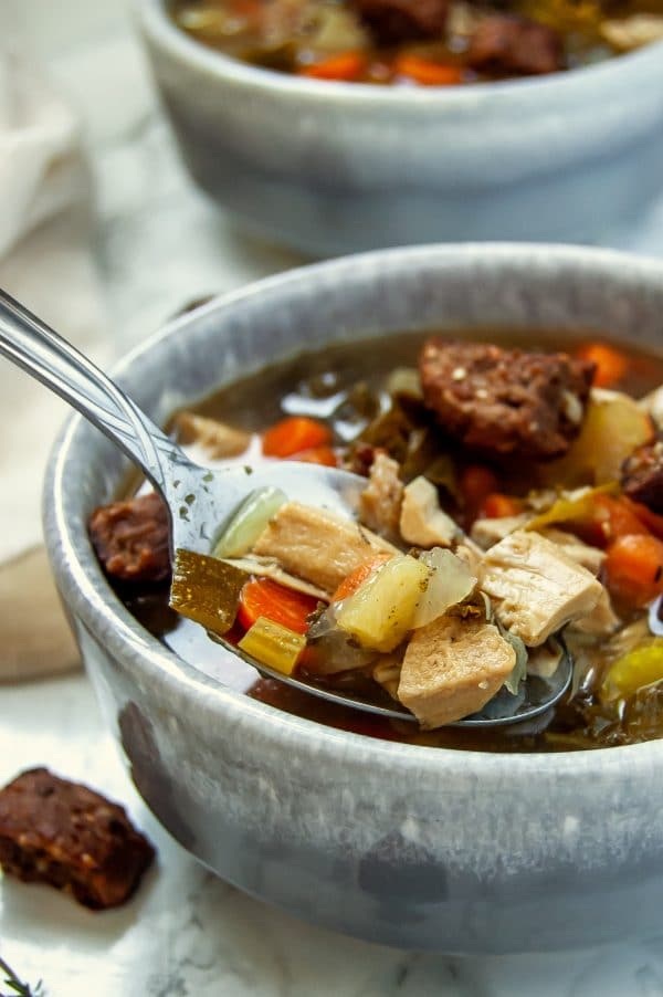 This leftover turkey soup recipe is an easy slow cooker recipe that helps use your Thanksgiving turkey leftovers! It's light and versatile - use your favorite vegetables!