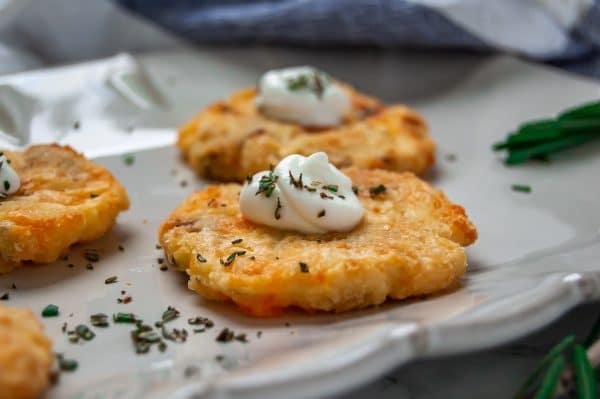 Mashed potato patties are a fun way to use up Thanksgiving leftovers. This leftover mashed potatoes recipe features baked mashed potato patties that are perfect appetizers for snacking!