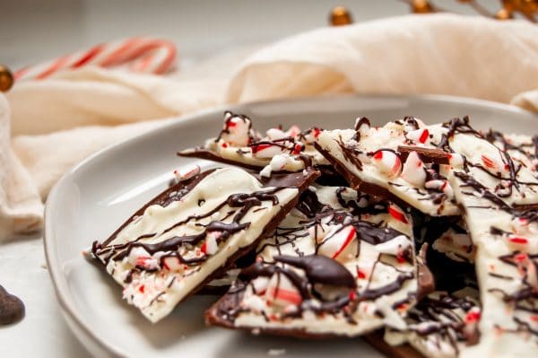 This triple chocolate peppermint bark is a delicious holiday treat, perfect for enjoying with family or giving as an edible holiday gift to loved ones!