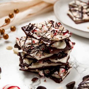 This triple chocolate peppermint bark is a delicious holiday treat, perfect for enjoying with family or giving as an edible holiday gift to loved ones!