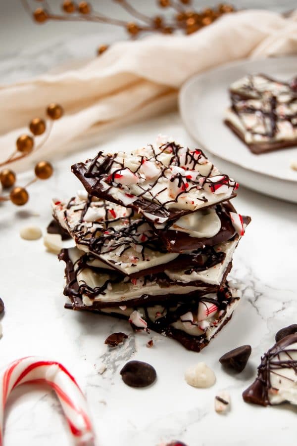 This triple chocolate peppermint bark is a delicious holiday treat, perfect for enjoying with family or giving as an edible holiday gift to loved ones!