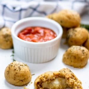 These mini cheesy rolls are delicious grain-free, gluten-free cheese stuffed bread rolls! They're the perfect healthy appetizer recipe for game days and parties!
