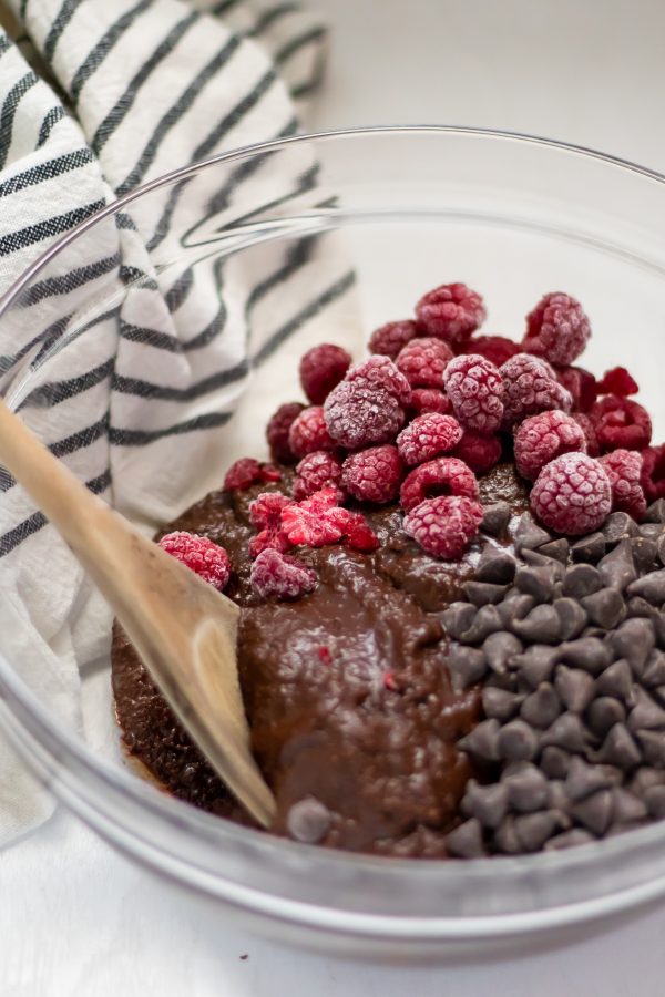 Simple Mills grain free brownie batter with frozen raspberries and chocolate chips.