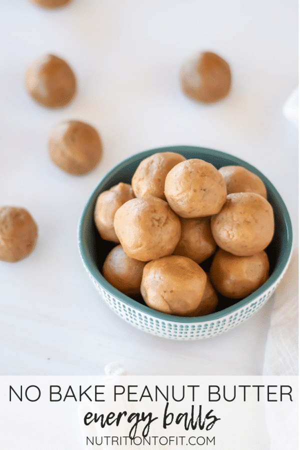 Pinterest Image of no bake peanut butter energy balls in a white bowl with teal accents with text on the bottom that says "no bake peanut butter energy balls"