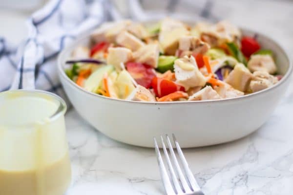 A grilled chicken honey mustard salad.