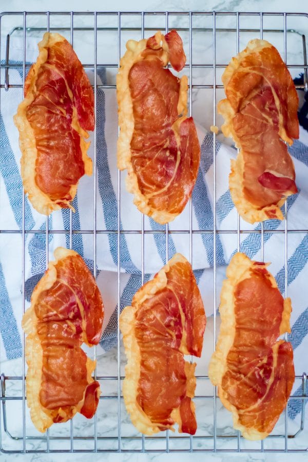 Crispy Prosciutto on baking rack with blue and white towel