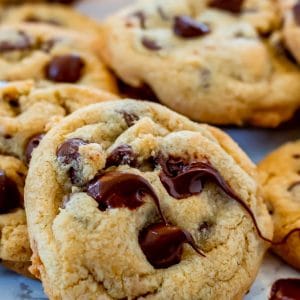 a close up of melty chocolate chips on a gluten free chocolate chip cookie