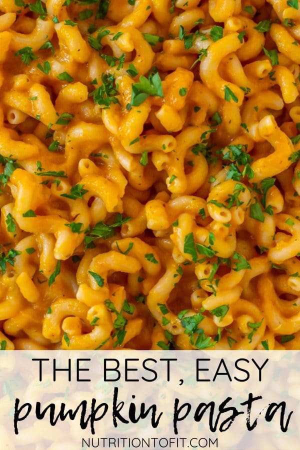 Pinterest image of up close spiral pasta noodles covered in pumpkin pasta sauce with green parsley and descriptive text.