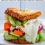 pinterest image for turkey avocado sandwich with veggies