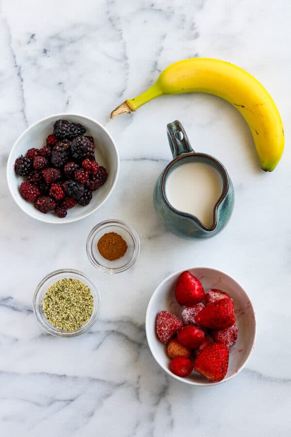 ingredients to make a strawberry blackberry banana smoothie