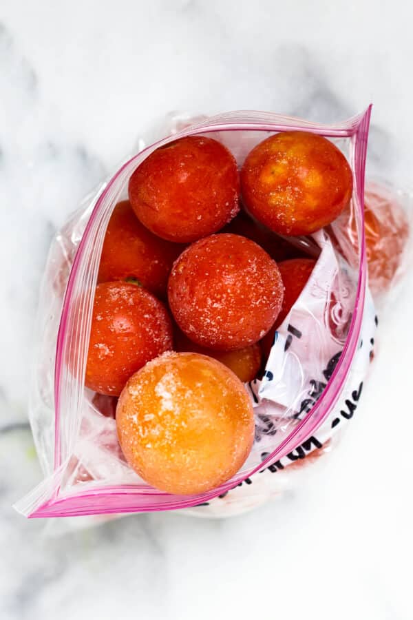 frozen cherry tomatoes in a freezer bag