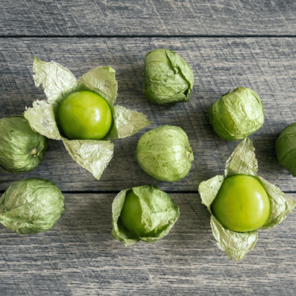 tomatillos on wood surface