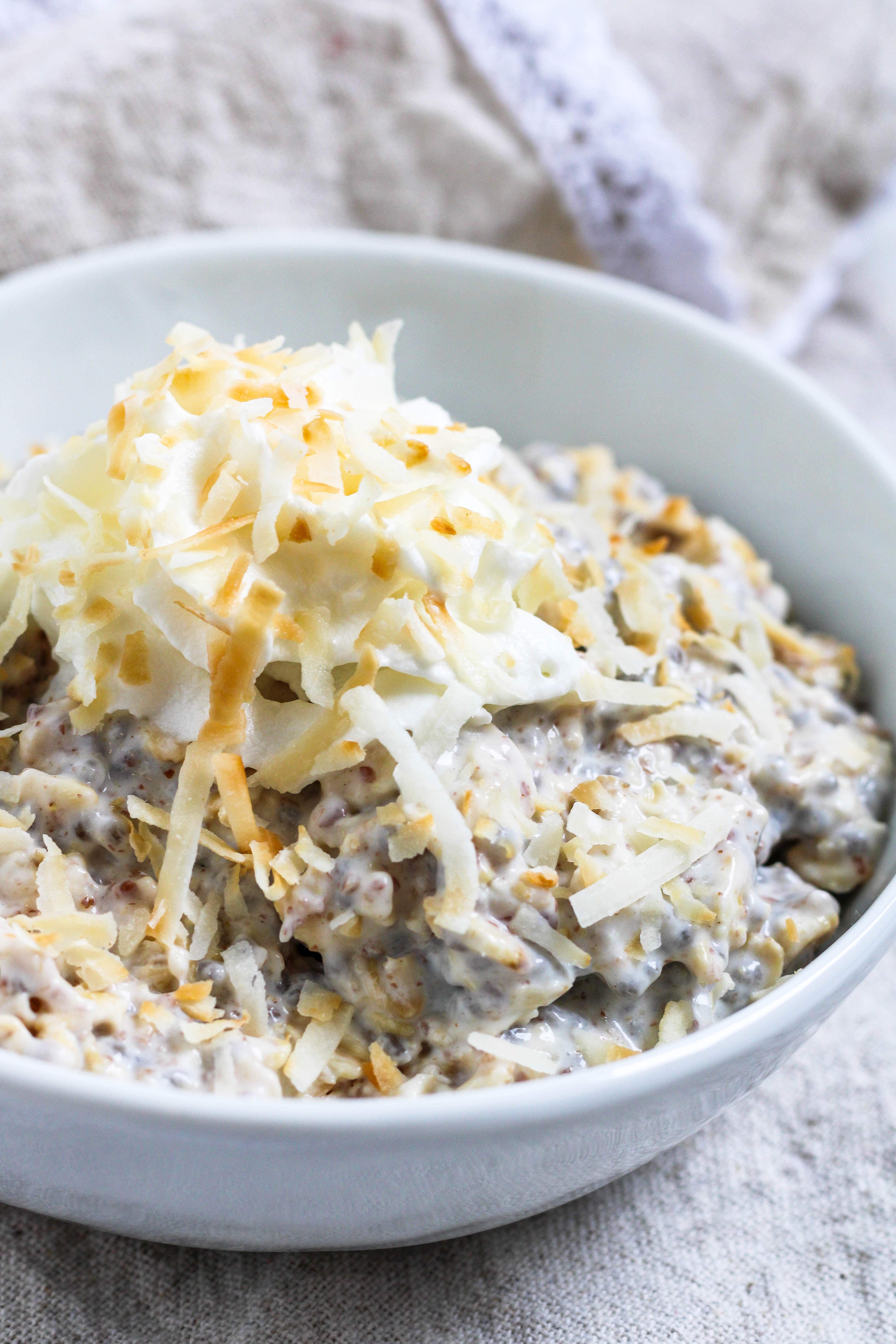 a white bowl of coconut milk overnight oats