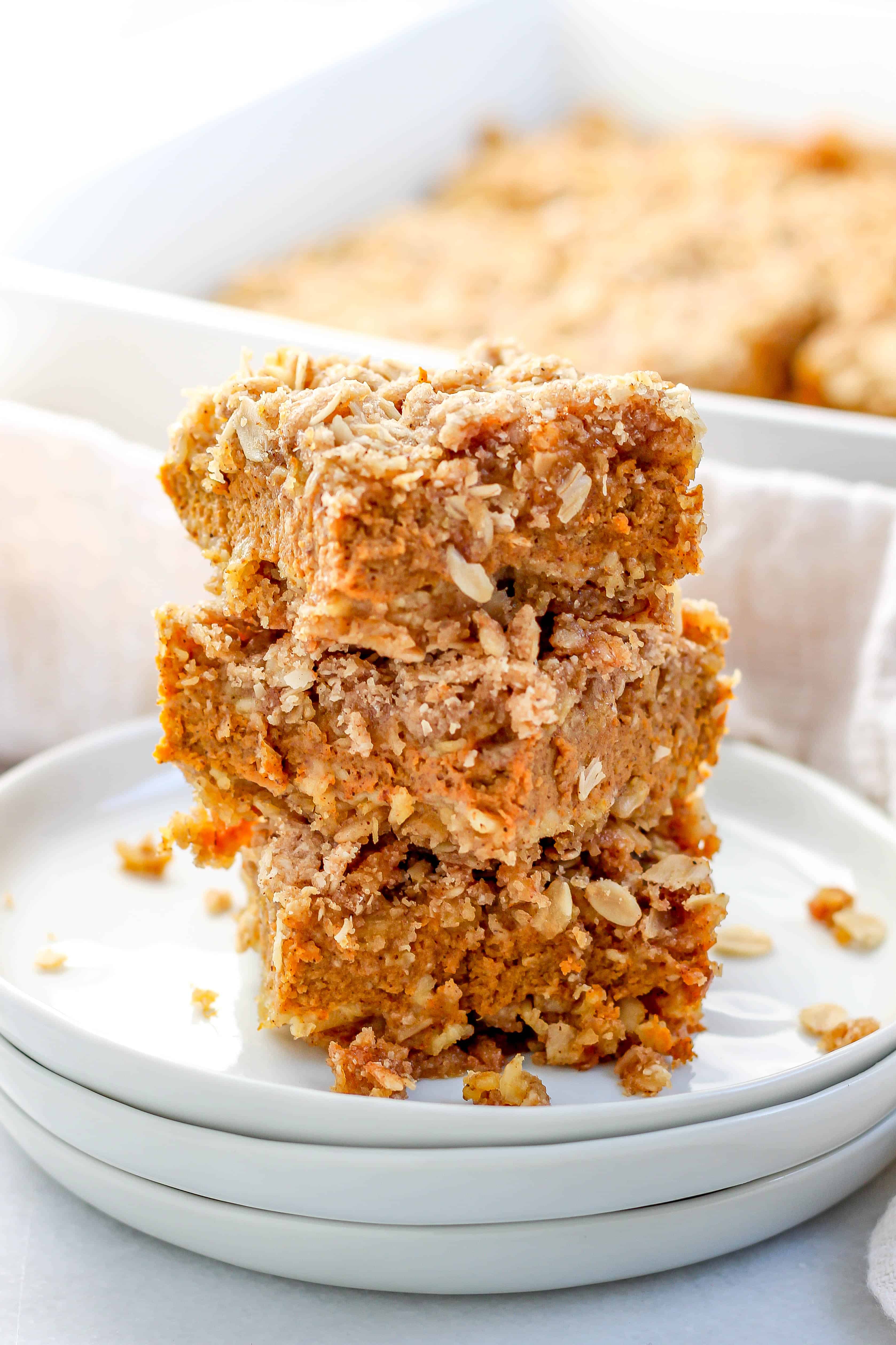 a stack of pumpkin crumble bars