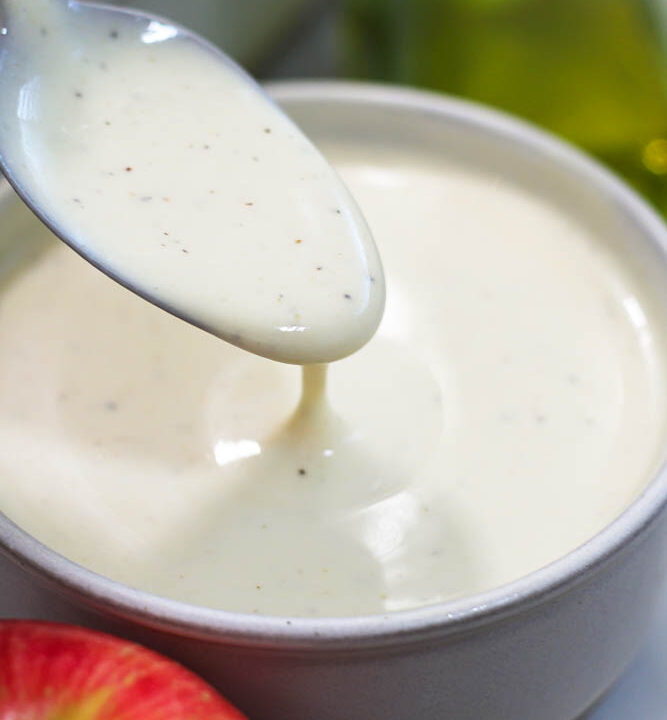 a spoonful of creamy apple cider dressing