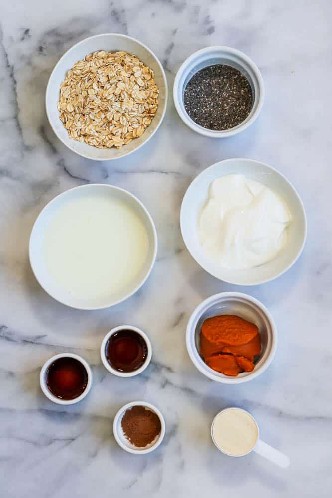 ingredients laid out to make pumpkin protein overnight oats