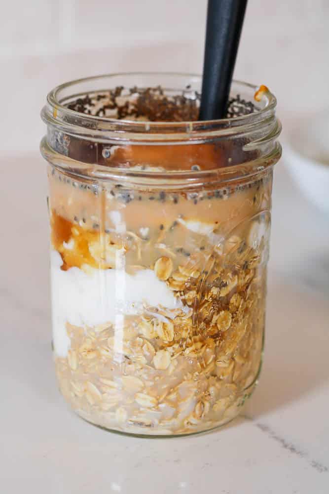 ingredients in a jar to make pumpkin protein overnight oats