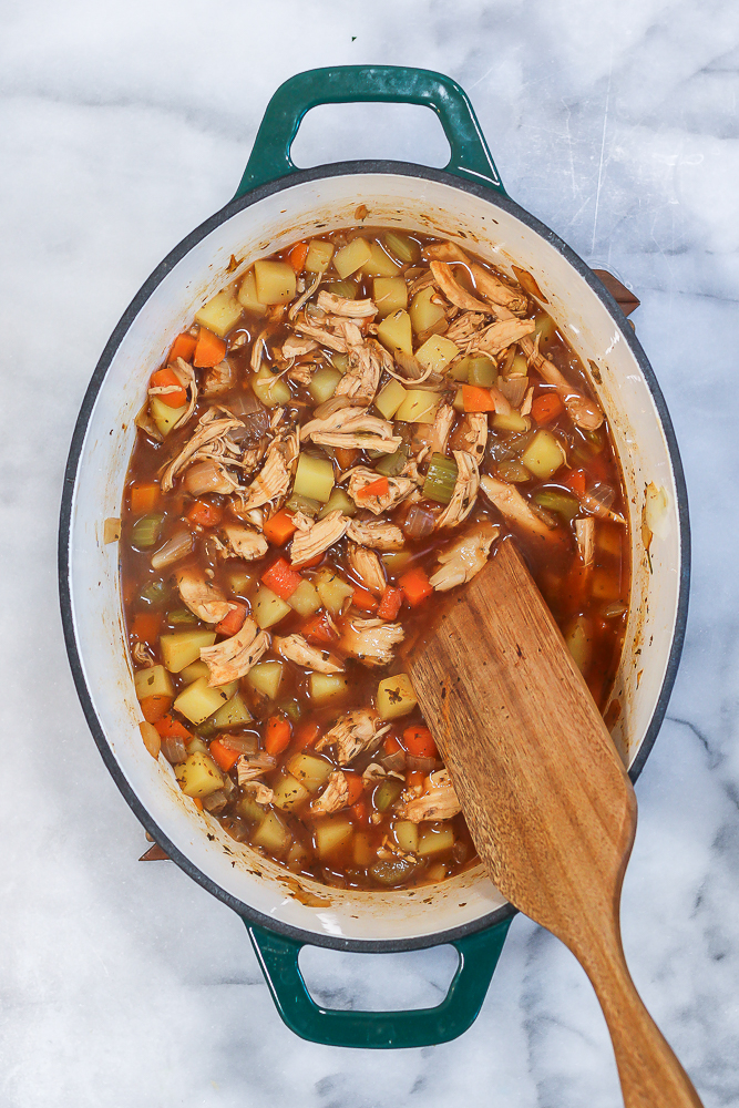 bone broth chicken soup in a dutch oven