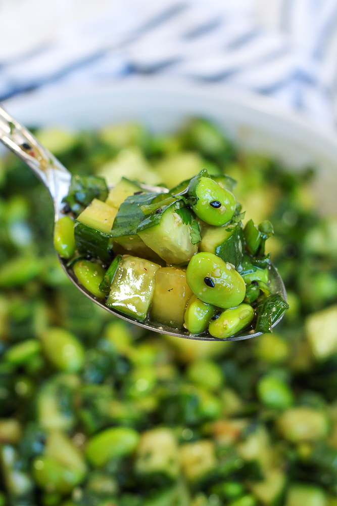 a large spoonful of edamame cucumber salad