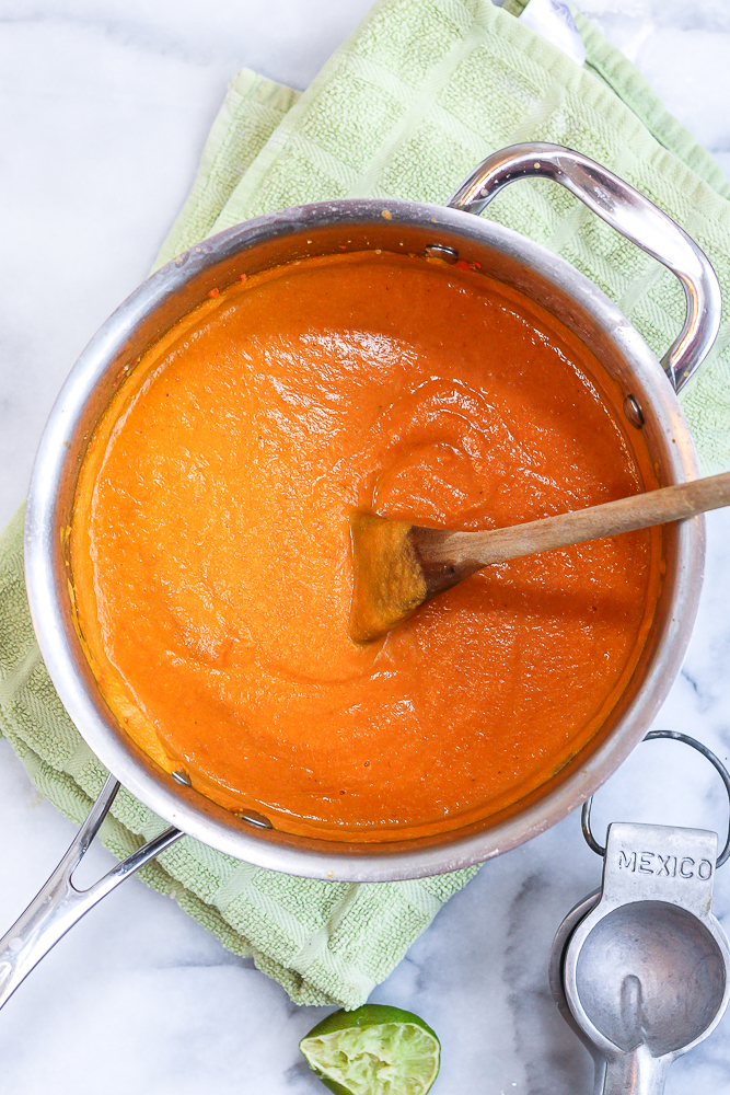 a pot of creamy cashew carrot ginger soup